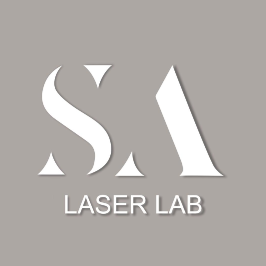 Clean, professional medical spa treatment room with neutral tones at SA Laser Lab in Wheeling